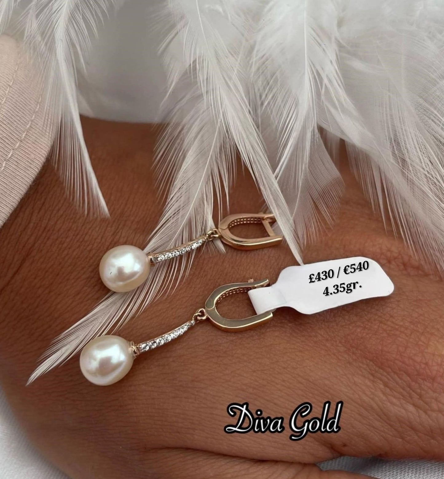 Gold 585 pearl earrings with zircon stones