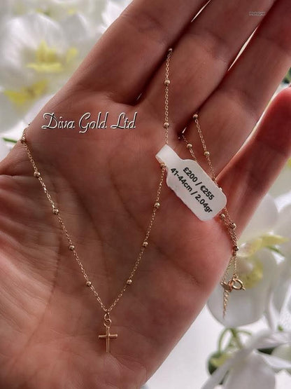 Gold chain with cross pendant. 41-44cm