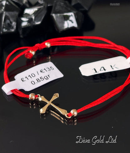 Red thread bracelet with 585 gold details. 0.85gram