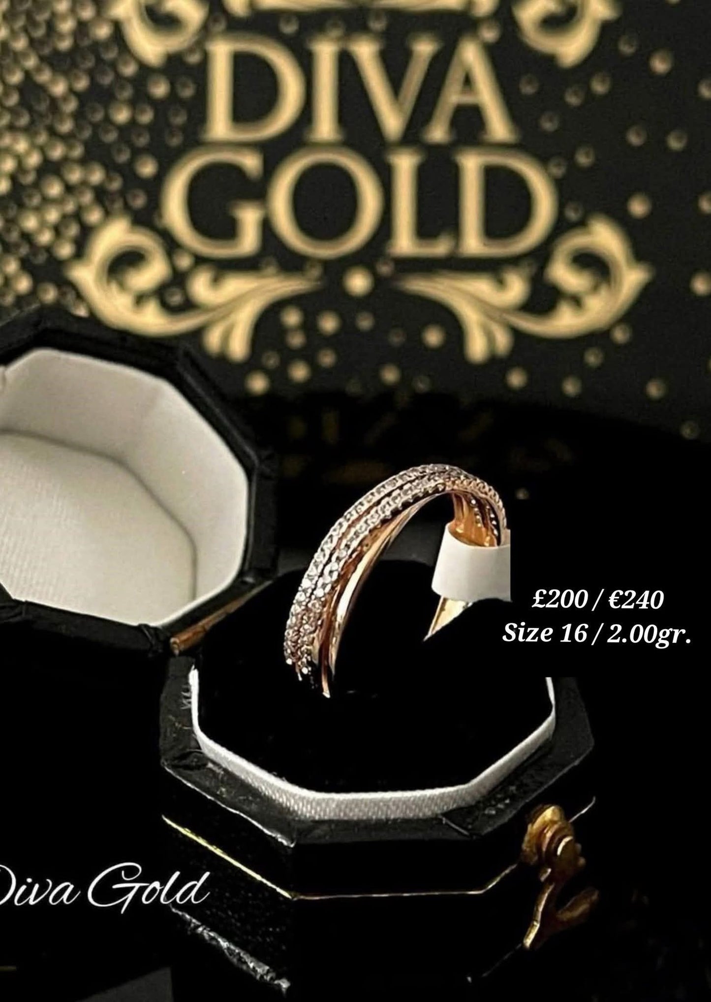 Gold ring with white zircon stones. Size 16