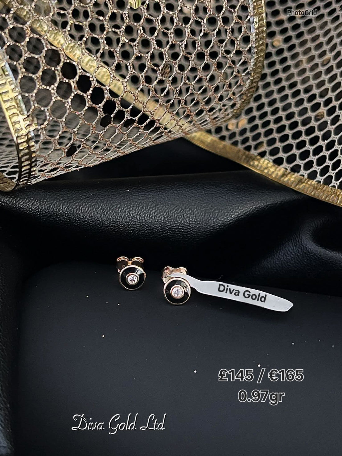 Stud gold earrings.