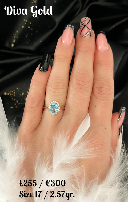 Gold ring with white&blue zircon stones. Size 17