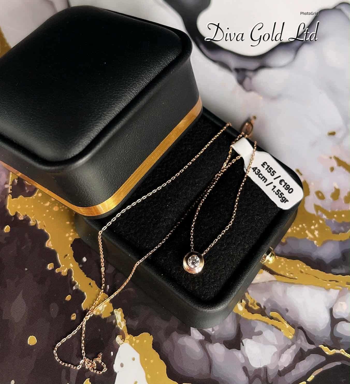 Gold chain with zircon stone pendant. 43cm