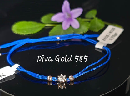 Blue thread bracelet with 585 gold details. 0.75gram
