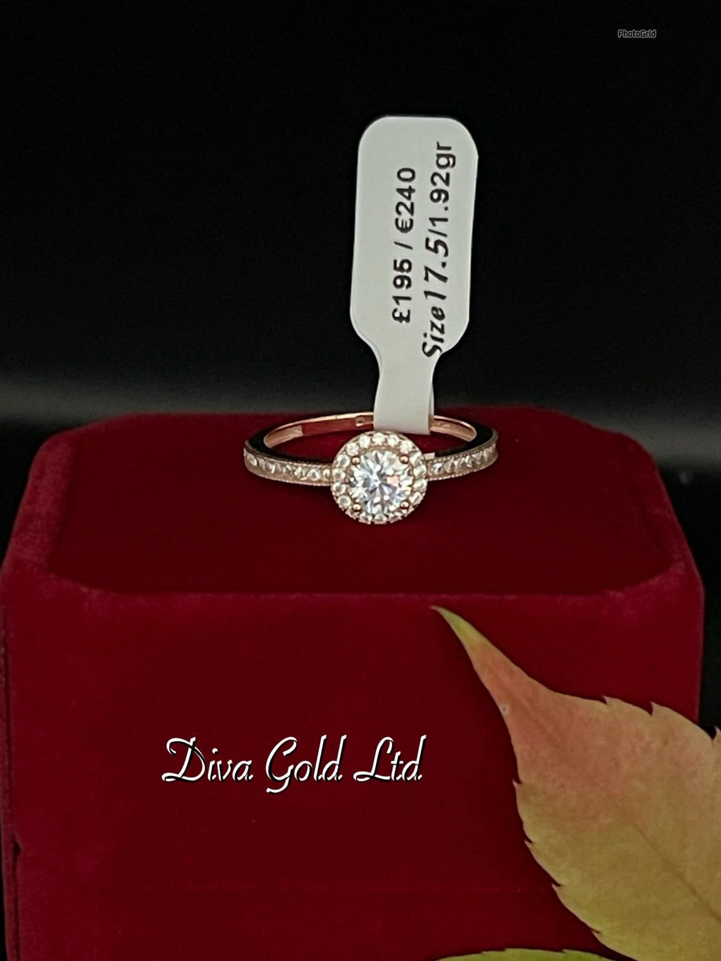 Gold ring with white zircon stones. Size 17.5