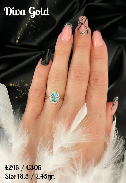 Gold ring with blue&white zircon stones. Size 18.5