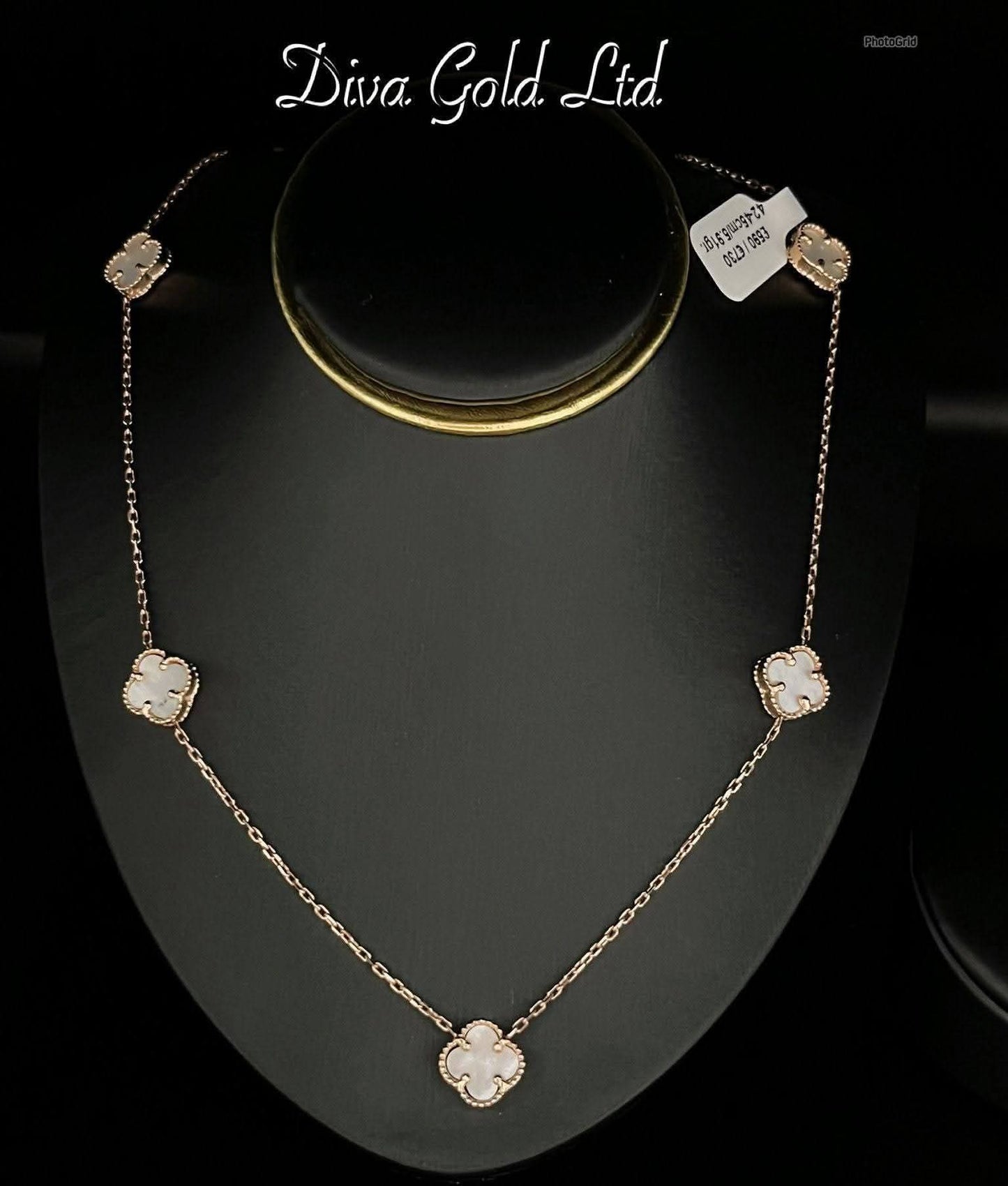Gold chain with white clover pendants. 42-45 cm