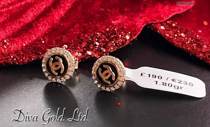 Gold 585 chanel studs earrings with white zircon stones.