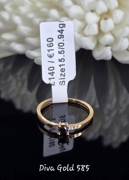 Gold women ring. Black & white zircon stones.Size 15.5