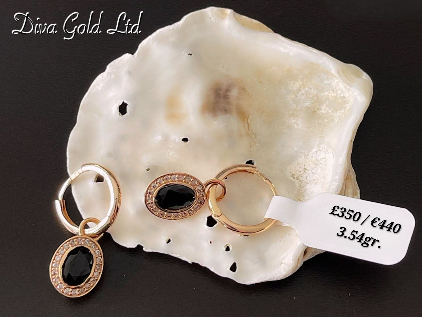 Gold 585 earrings with white & black zircon stones