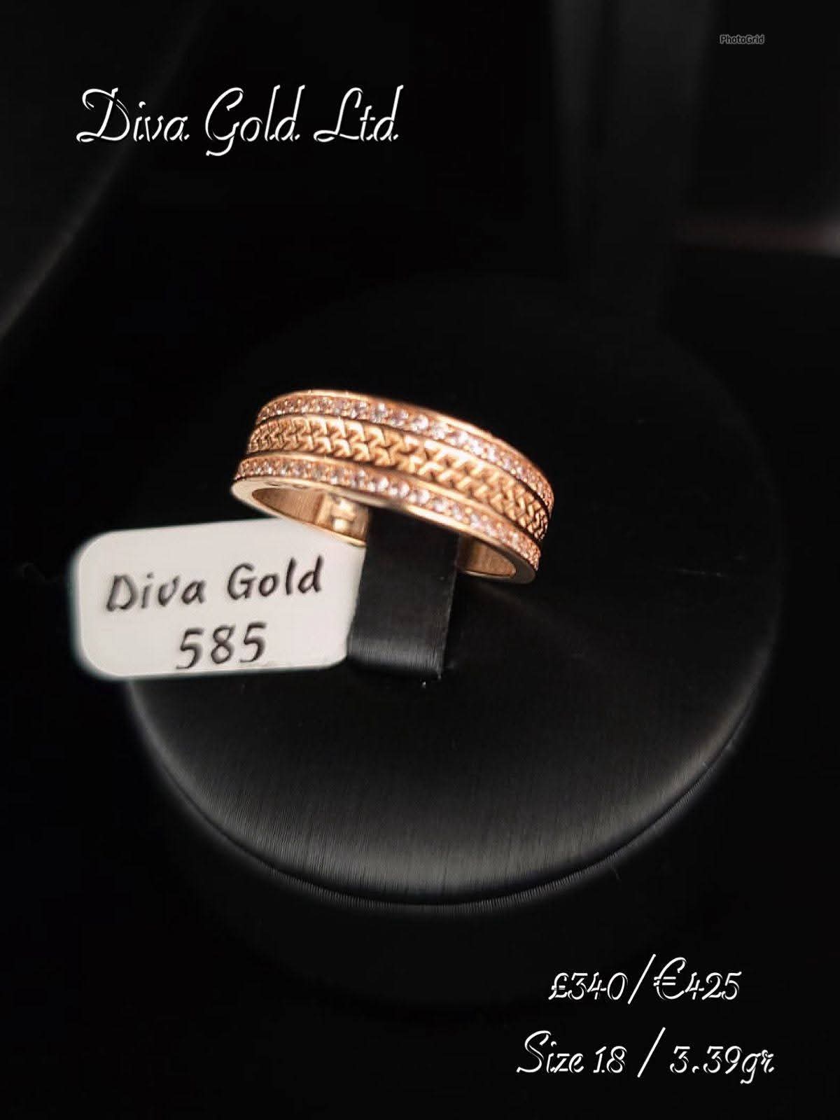 Gold ring with zircon stones. Size 18