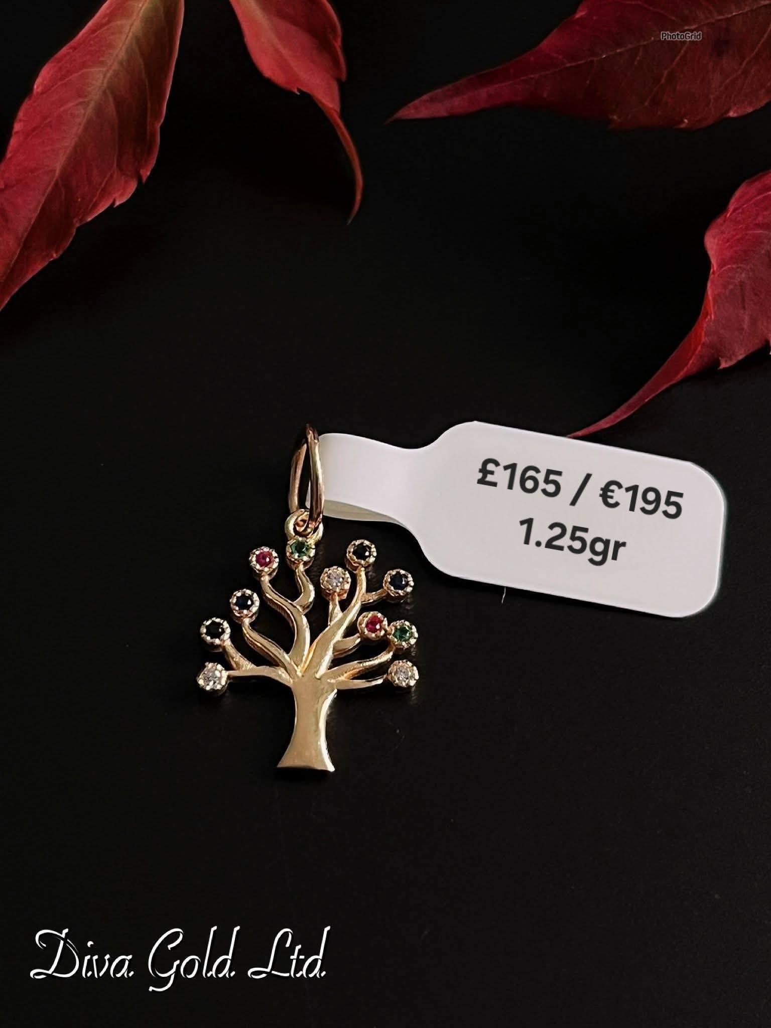 585 Gold family tree pendant. 1.25gr