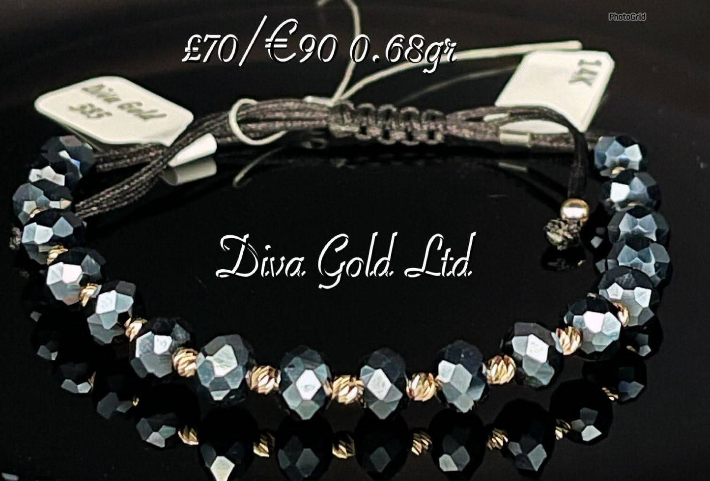 Black thread bracelet with gold details.