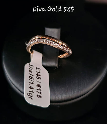 Gold ring with white zircon stones. Size 16