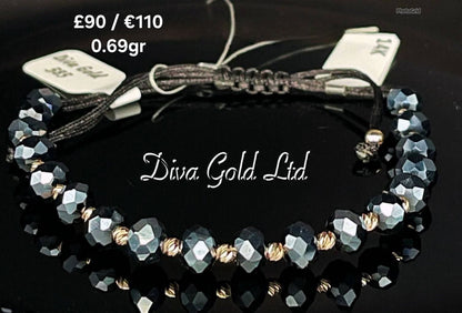 black thread bracelet with 585 gold details / blue beads