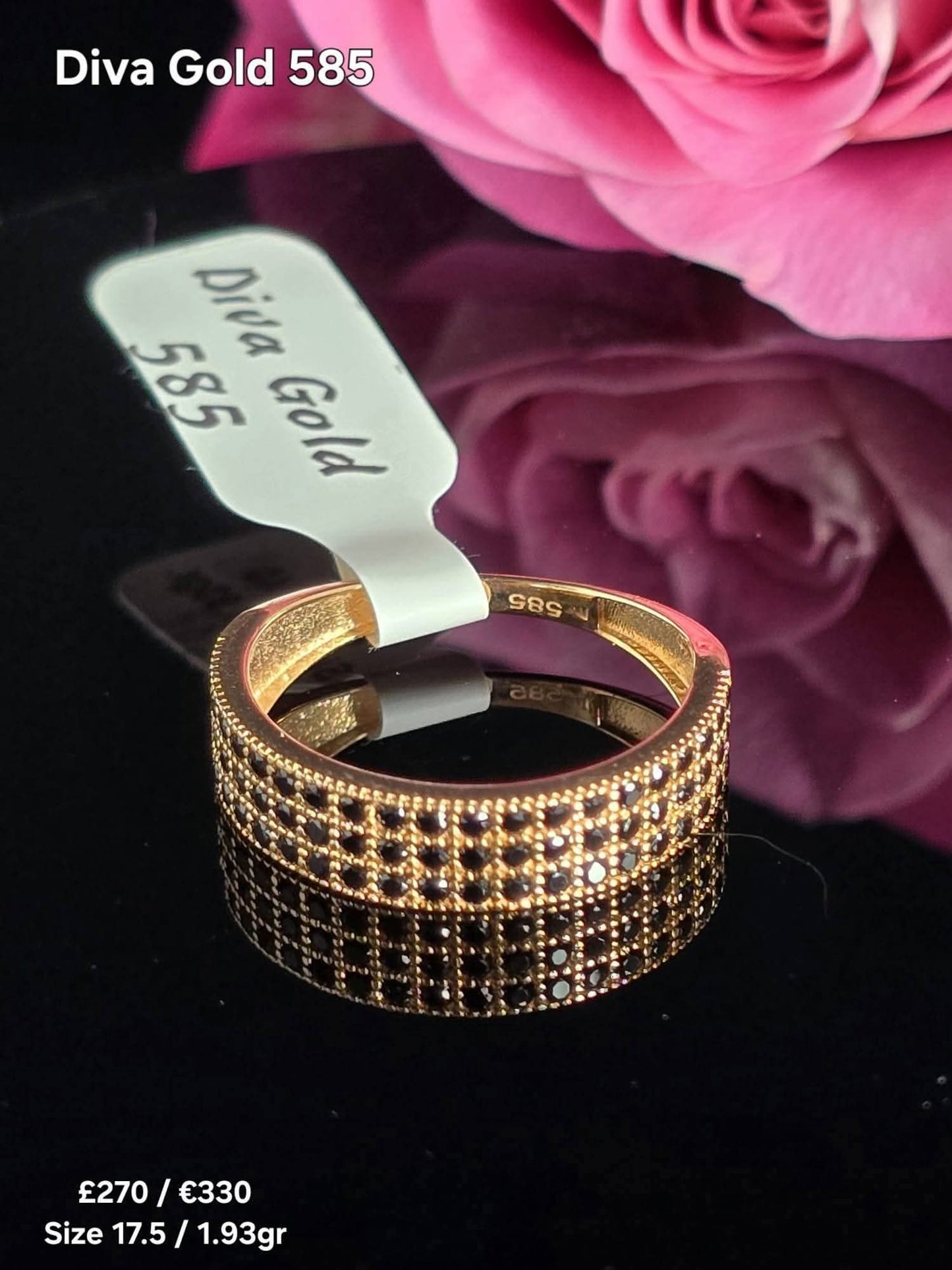 Gold women ring / black zircon stones.Size 17.5