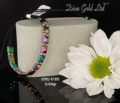 Colored thread bracelet with gold details.