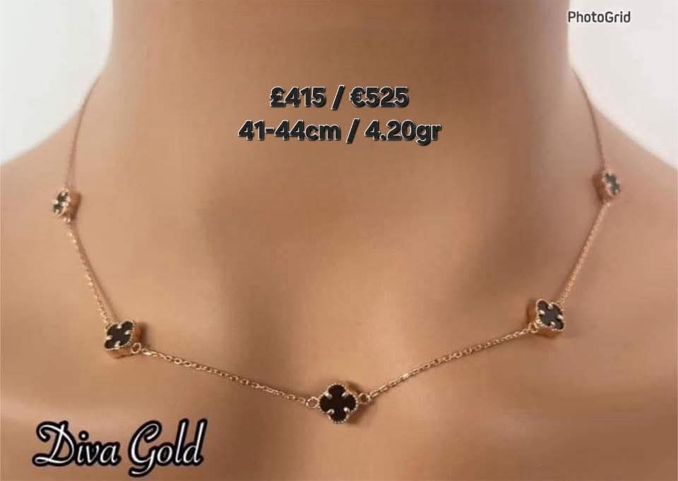 Gold chain with black clover pendants. 41-44cm