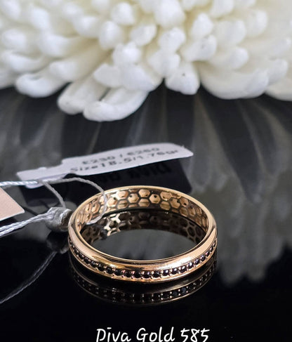 Gold women ring with black zircon stones. Size 18.5