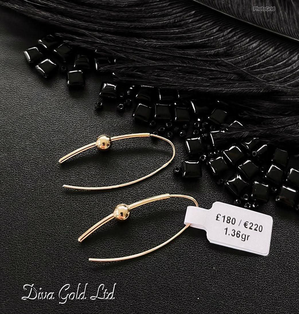 585 Gold earrings. 1.36 gram