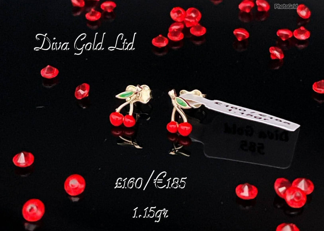 Stud gold earrings.