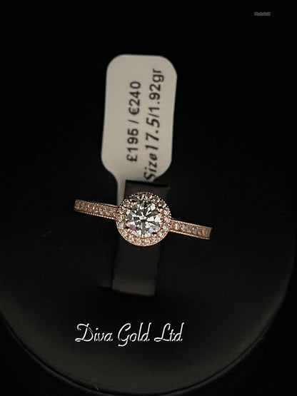 Gold ring with white zircon stones. Size 17.5