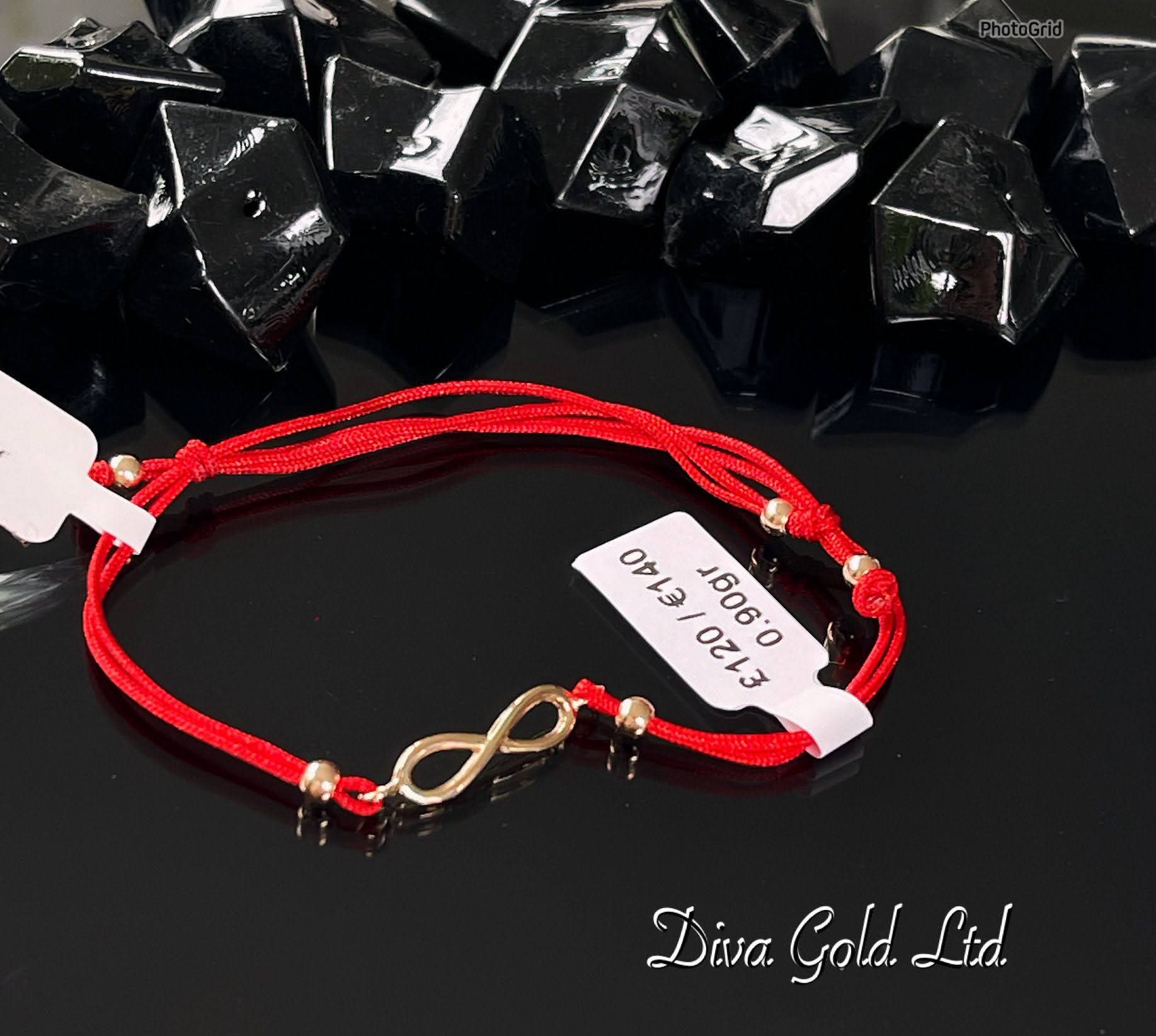 Red thread bracelet with 585 gold details. 0.90gram