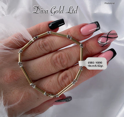 Gold bracelet with white gold details.  19cm