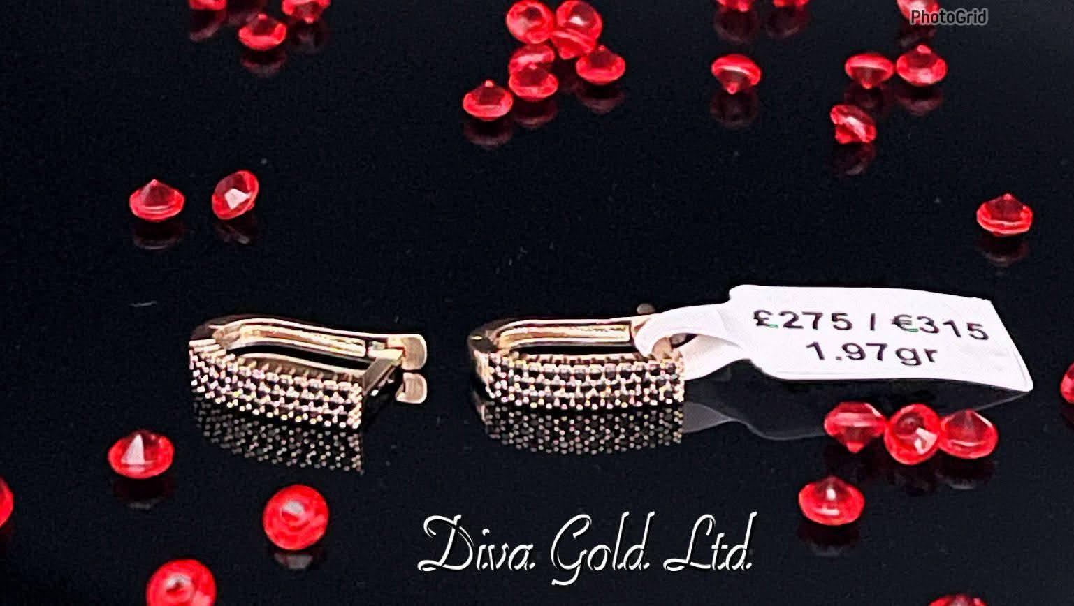 585 Gold earrings with blavk zircon stones. 1.97 gram