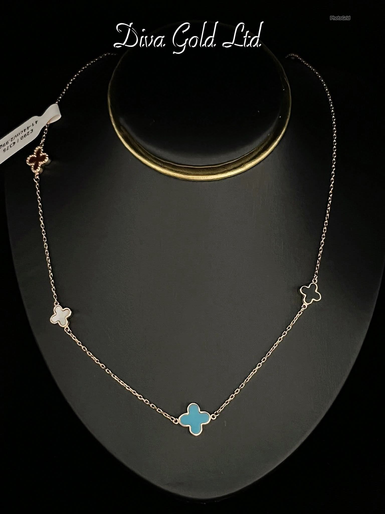 Gold chain with clovers pendants.  41-44cm