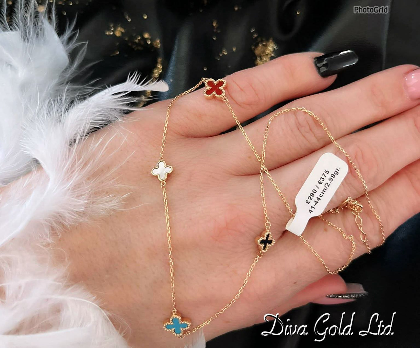 Gold chain with clovers pendants.  41-44cm