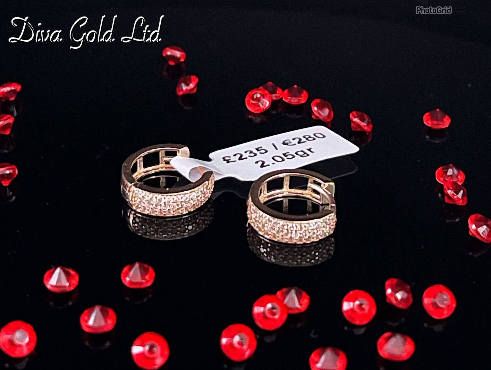 585 Gold Hoops earrings with white zircon stones.