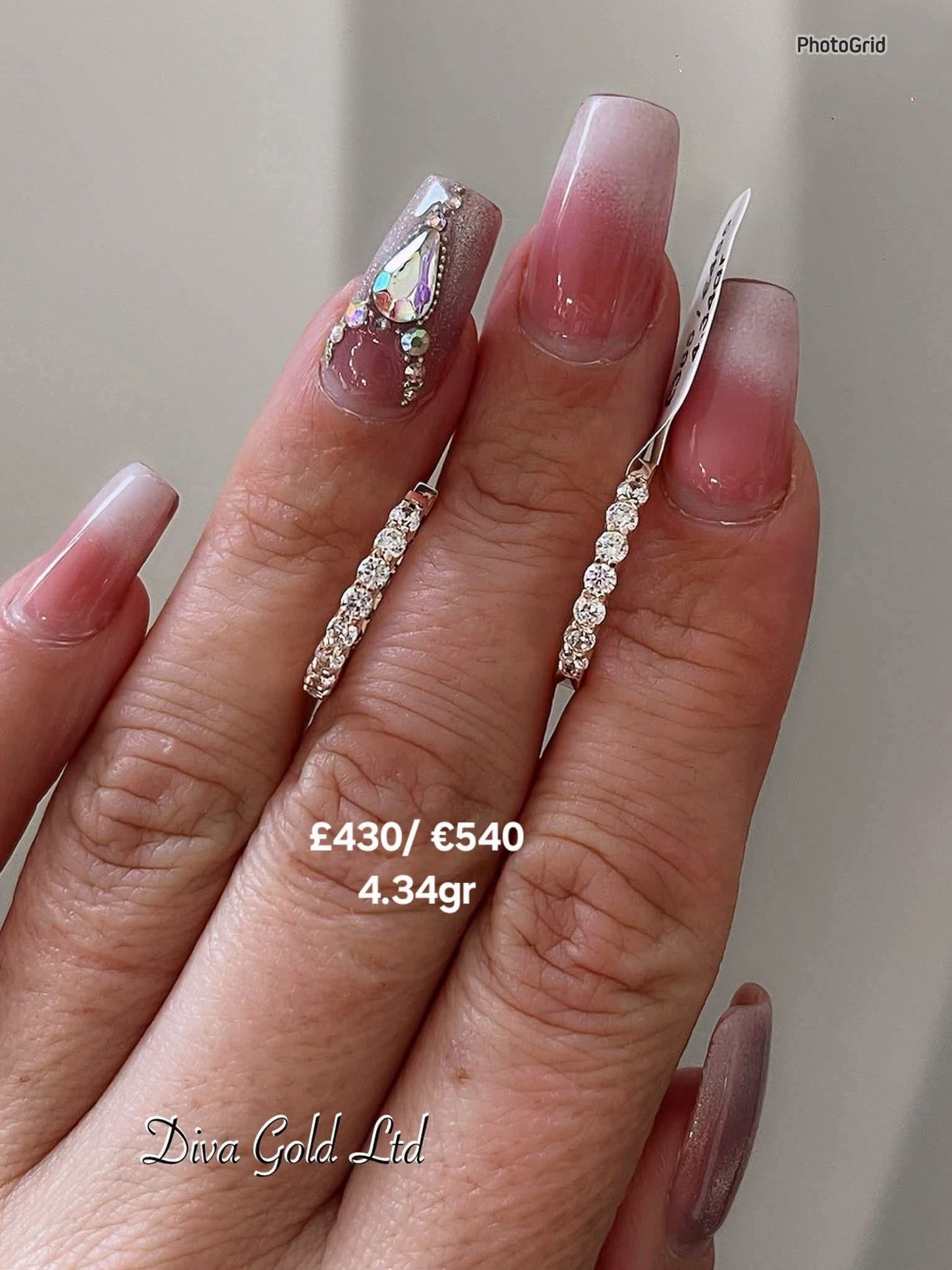 Gold 585 earrings with zircon stones.