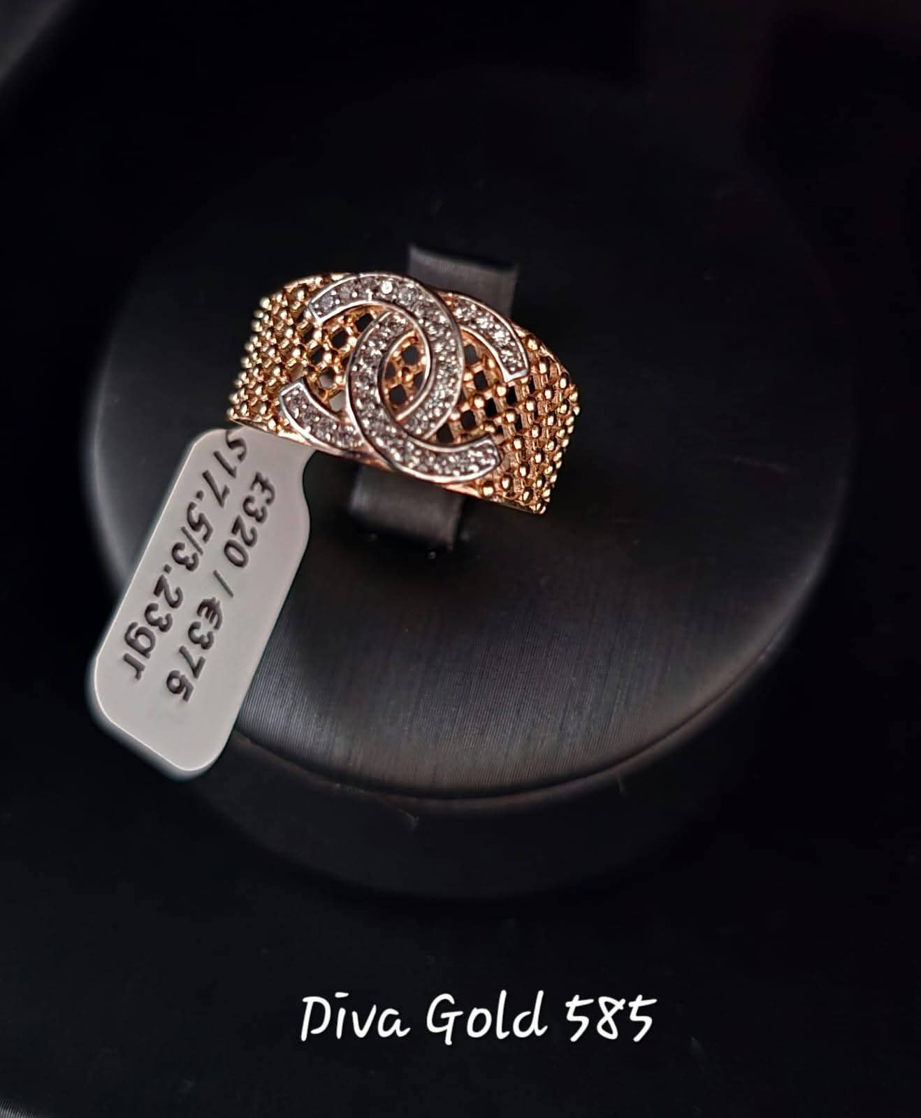Gold chanel ring with white zircon stones.  Size 17.5