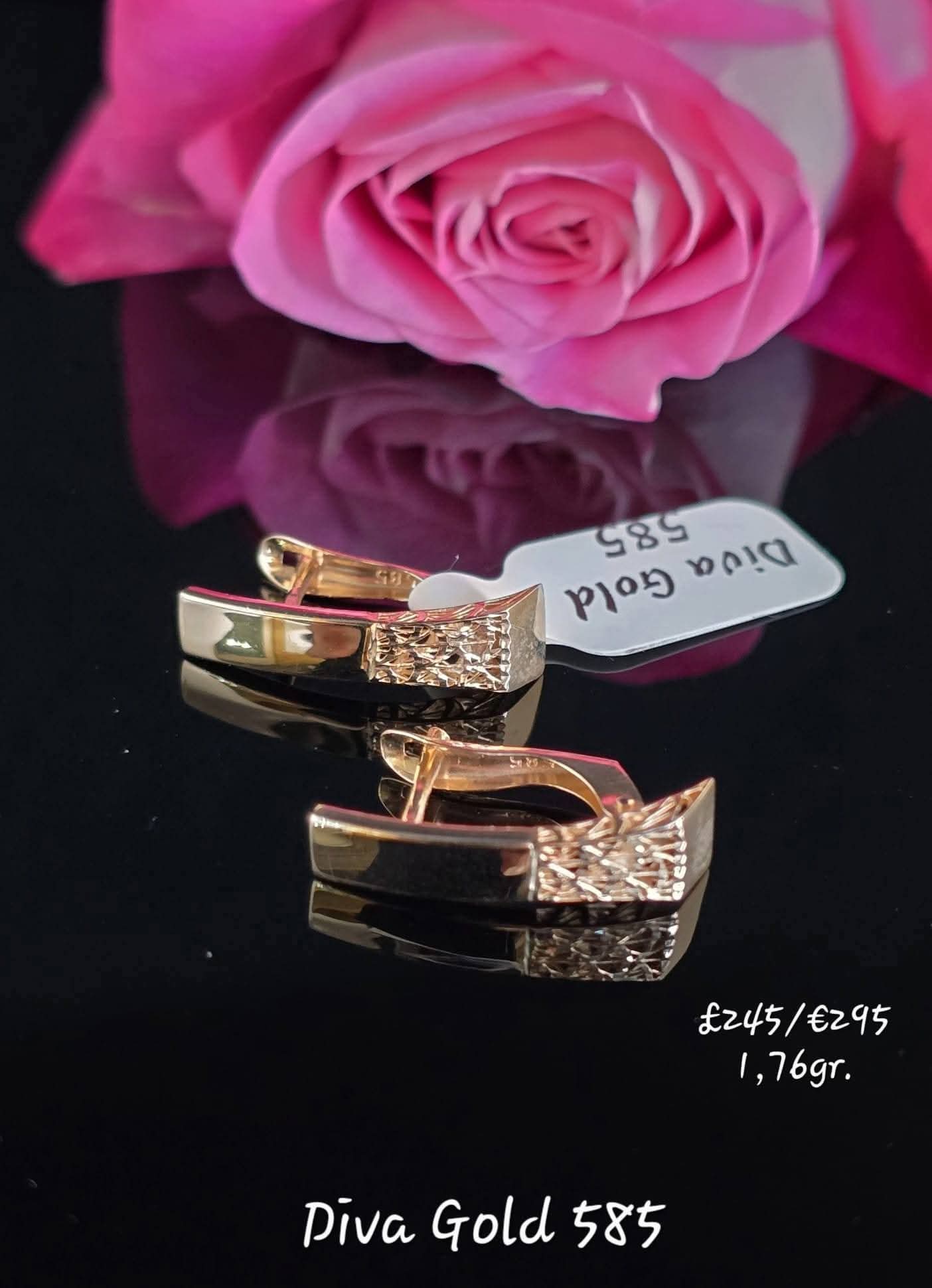 585 Gold earrings. 1.76gr