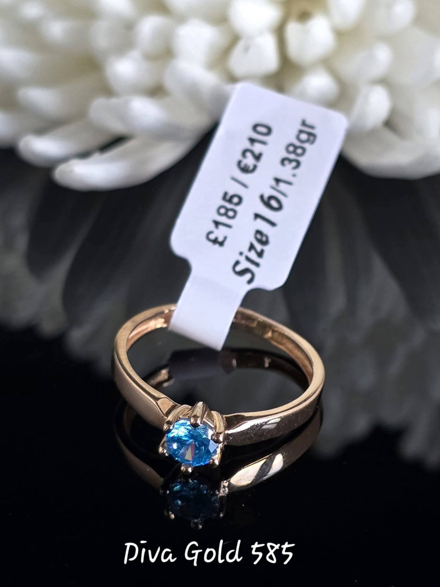 Gold women ring. Blue zircon stone. Size 16