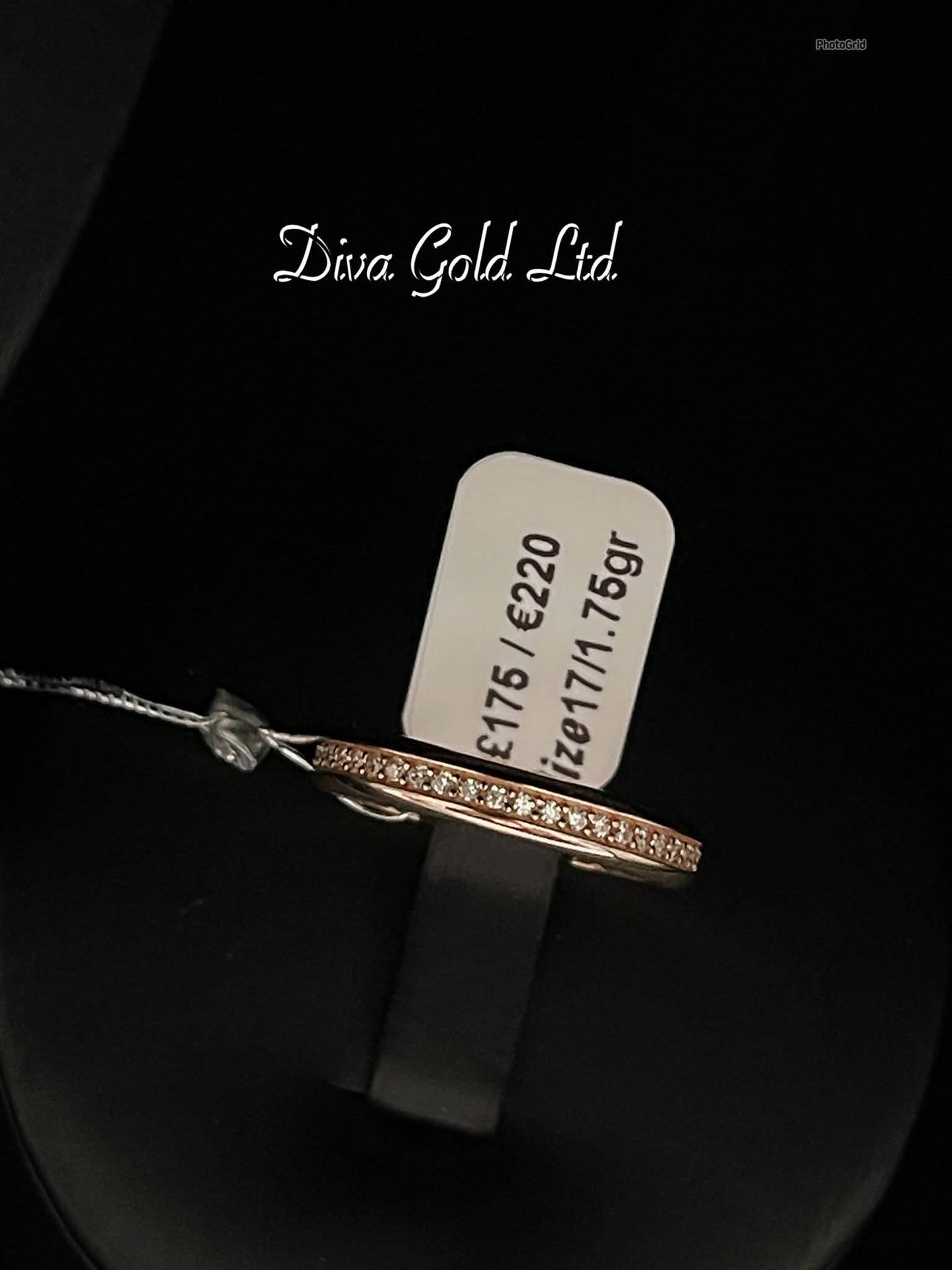 Gold ring with white zircon stones.  Size 17