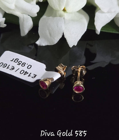 Stud gold earrings. Pink zircon stones