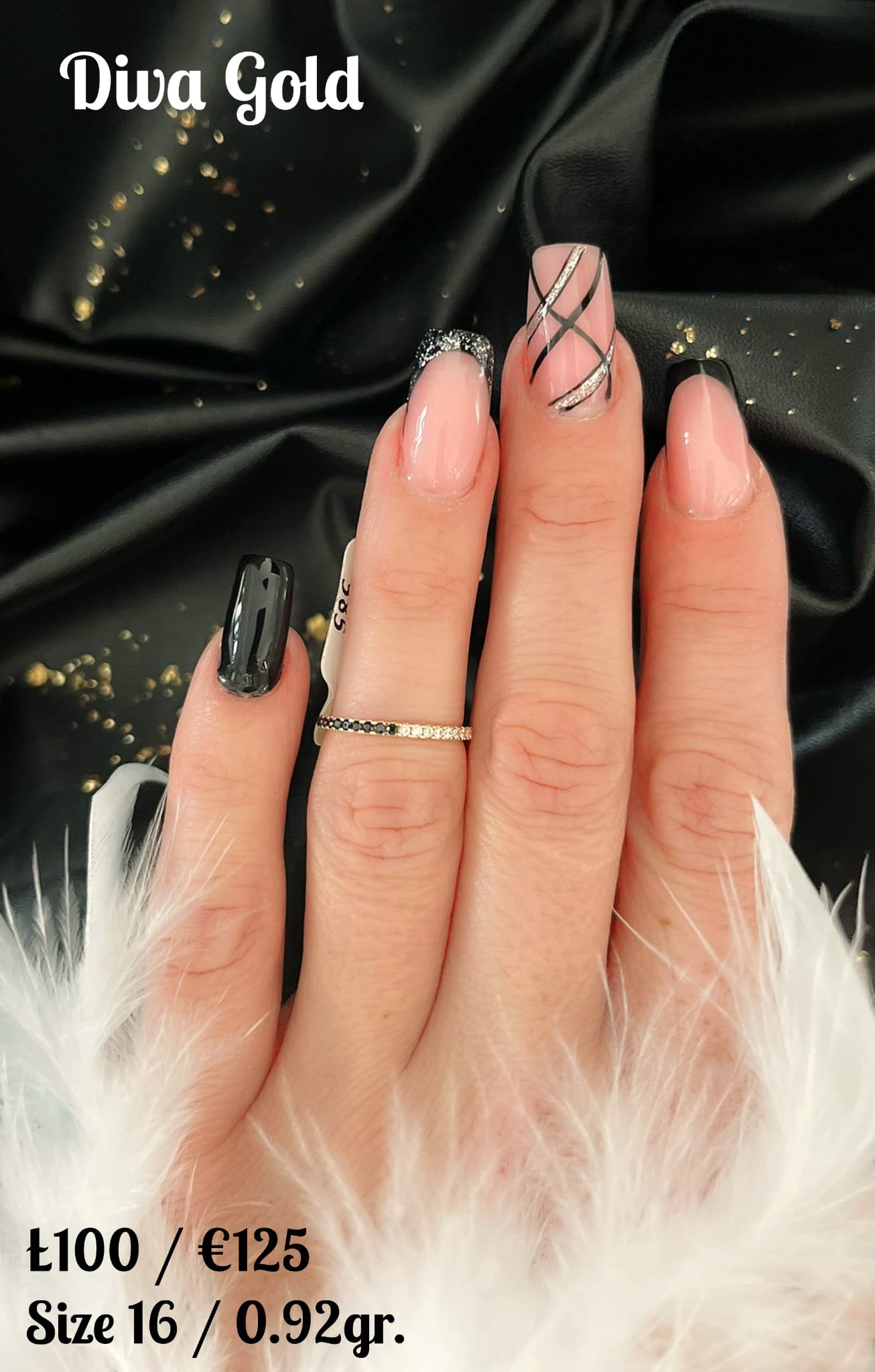 Gold ring with white & black zircon stones. Size 16