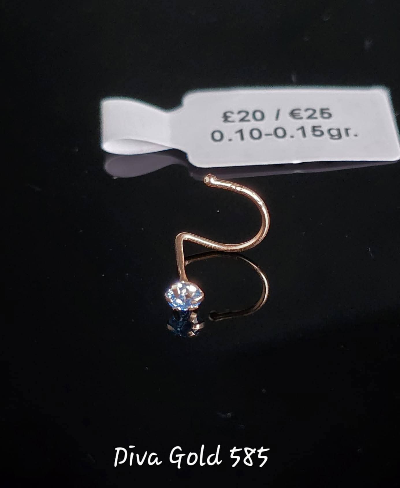 585 Gold nose piercing with blue zircon stone. 0.10 - 0.15 gr