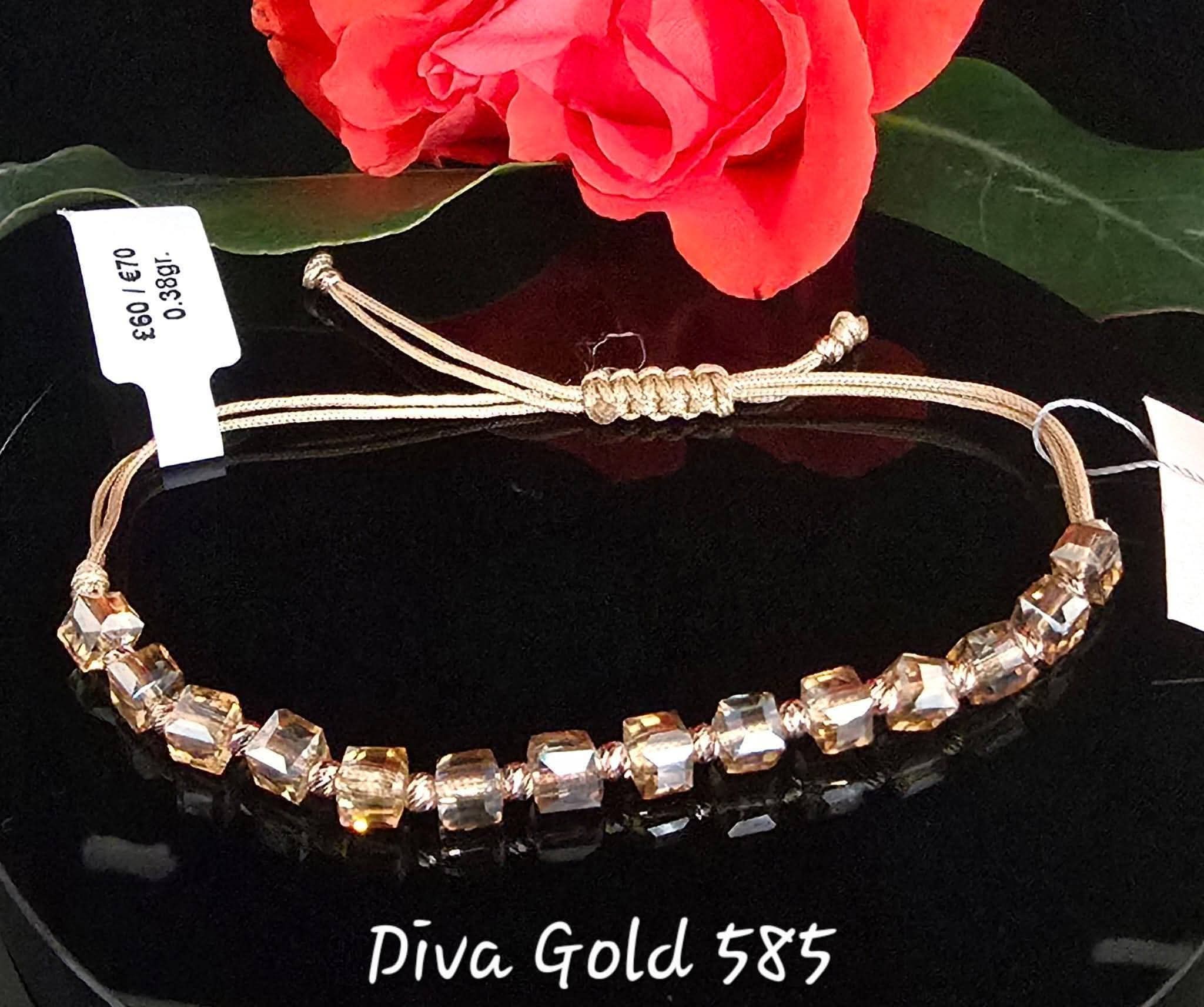 thread bracelet with 585 gold details. 0.38gram