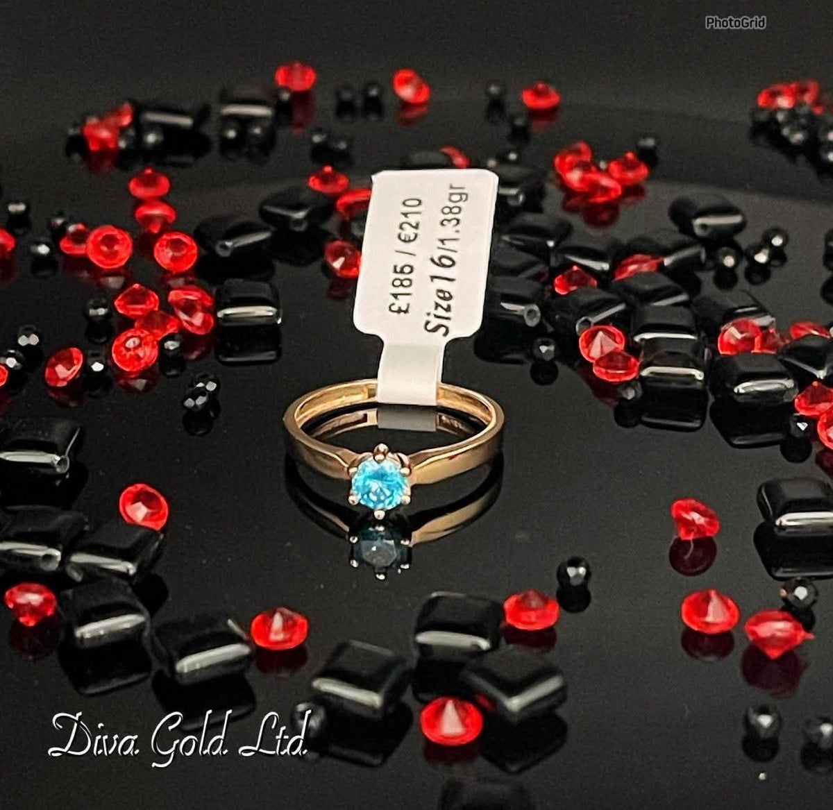 Gold women ring. Blue zircon stone. Size 16