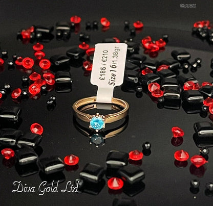 Gold women ring. Blue zircon stone. Size 16