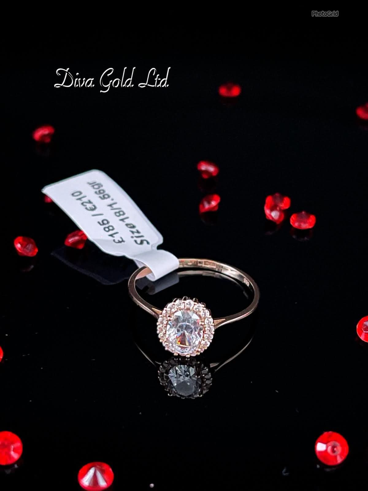 585 Gold ring with whites zircon stones. Size 18