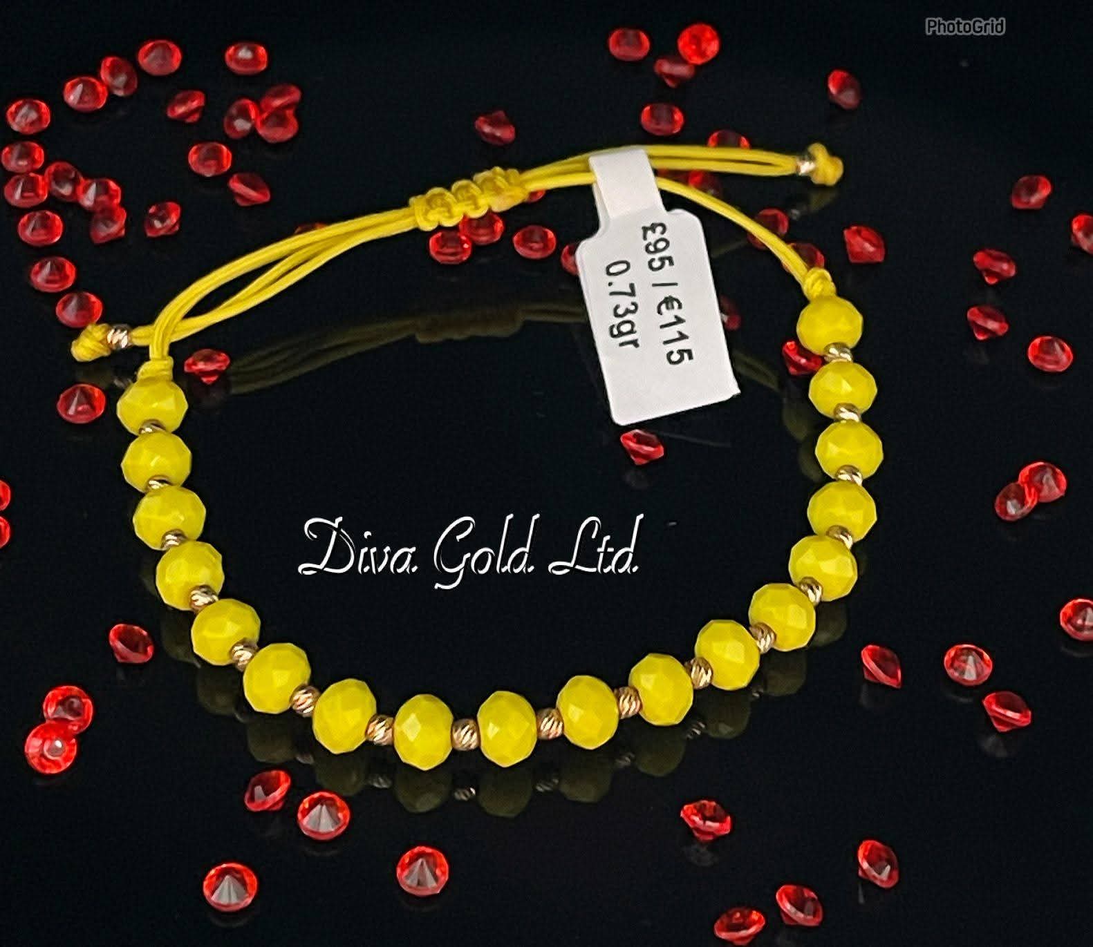 Yellow thread bracelet with gold 585 details