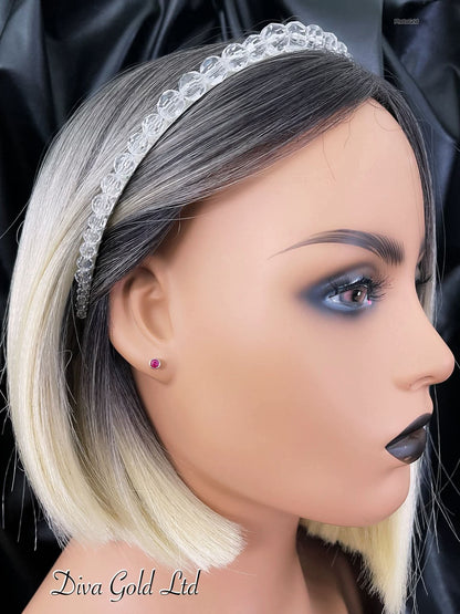 Gold 585 studs earrings with pink zircon stones.