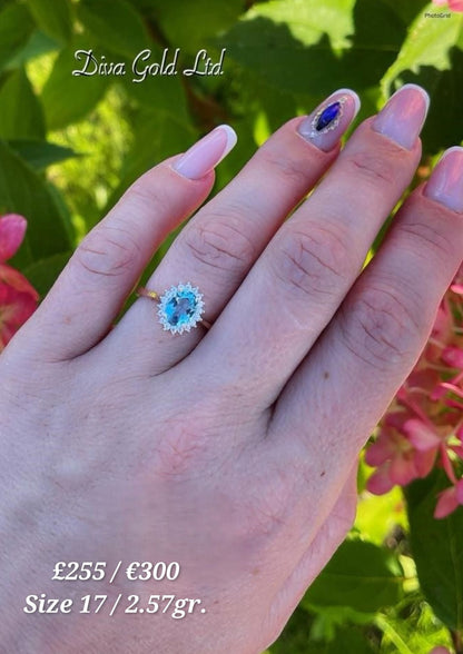 Gold ring with white&blue zircon stones. Size 17