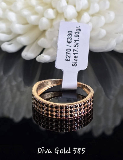 Gold women ring / black zircon stones.Size 17.5