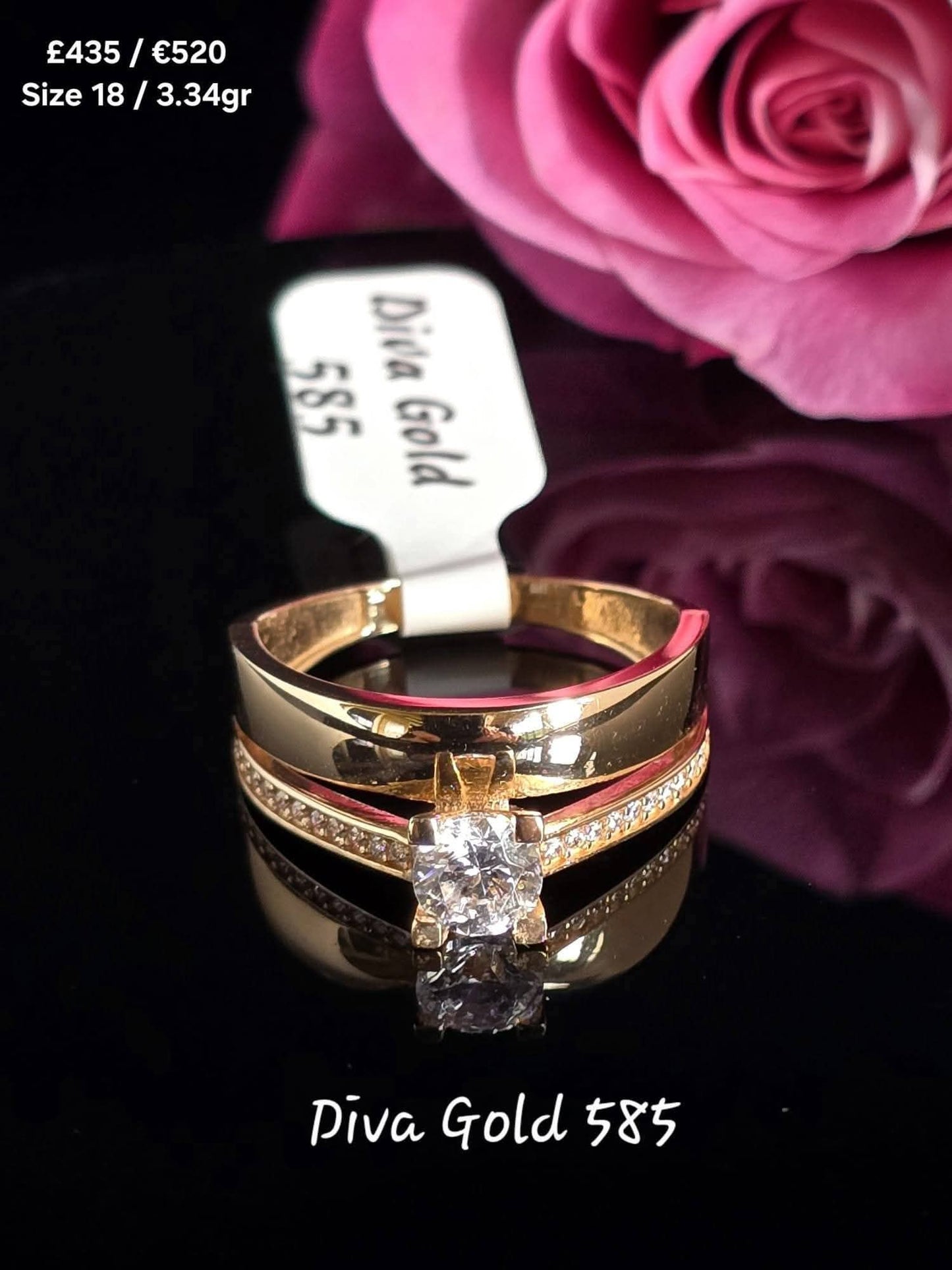 Gold women ring with white zircon stones. Size 18