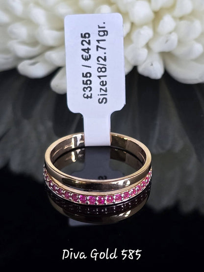 Gold women ring with pink zircon stones .Size 18